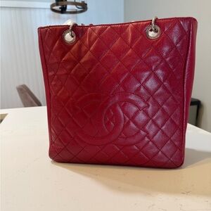 Change red caviar vertical grand shopping tote